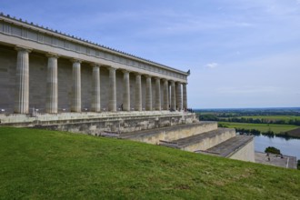 Side view of a building with columns, embedded in a green landscape, Walhalla, Donaustauf, Danube,
