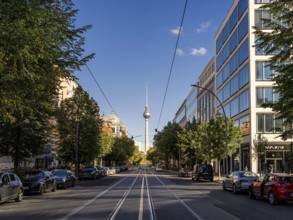 Oranienburger Straße with a view of the television tower at Alexanderplatz, Berlin, Germany