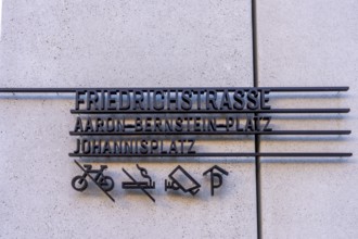 Modern street signage on a house wall, Berlin, Germany