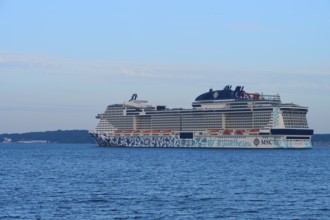 Cruise ship, MSC Euribia, sailing across the open sea in the distance, Heikendorf, Plön district,