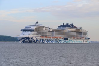 Impressive cruise ship, MSC Euribia, on the sea under a slightly cloudy sky, Heikendorf, Plön