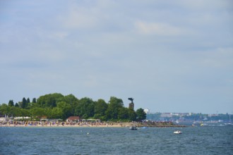 Beach with trees and many visitors by the sea, Heikendorf, Plön district, Kiel Fjord,