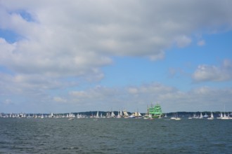 Regatta of sailing boats on the ocean on a cloudy day, Windjammer Parade Kiel 2025, Heikendorf,