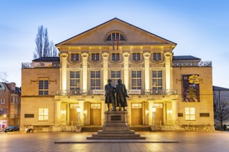 The German National Theatre with the Goethe and Schiller Monument at dusk, Weimar, Thuringia,