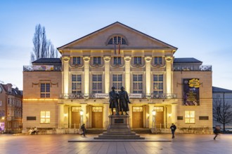 The German National Theatre with the Goethe and Schiller Monument at dusk, Weimar, Thuringia,