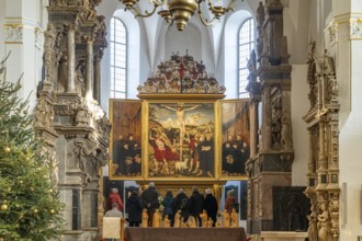 Three-panelled altarpiece Christ on the Cross by Lucas Cranach in the Stadtkirche St. Peter & Paul