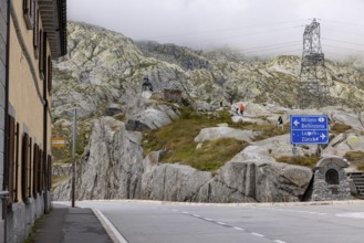 Road junction at the top of the Gotthard Pass, junction to Milan and Bellinzona and to Lucerne and