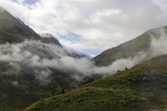 Fog, view of Val Curnera, Oberalp Pass, Surselva, Grisons, Switzerland