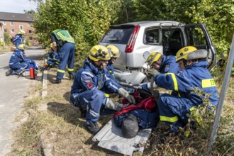 Rescue of people from a car that has crashed into a house, large-scale exercise FÜLEX25, of the