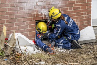 Rescue and recovery of people after a drone attack on a residential building in a civil defence