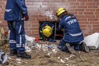 Rescue and recovery of people after a drone attack on a residential building in a civil defence