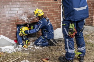 Rescue and recovery of people after a drone attack on a residential building in a civil defence