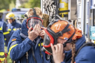 Civil defence exercise scenario, after a drone attack on a residential area, emergency services