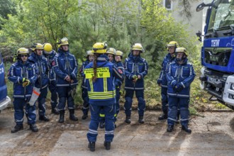 Civil defence exercise scenario, after a drone attack on a residential area, emergency services