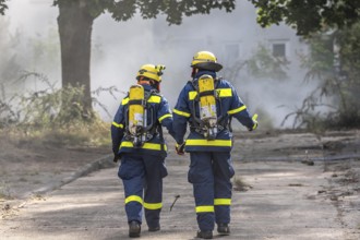 Civil defence exercise scenario, after a drone attack on a residential area, emergency services