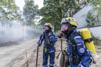Civil defence exercise scenario, after a drone attack on a residential area, emergency services