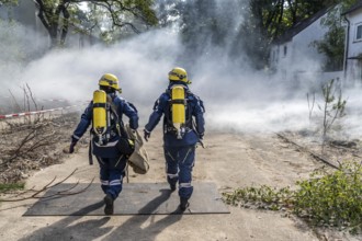 Civil defence exercise scenario, after a drone attack on a residential area, emergency services
