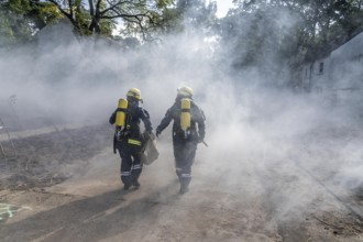 Civil defence exercise scenario, after a drone attack on a residential area, emergency services