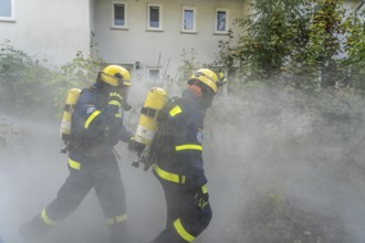 Civil defence exercise scenario, after a drone attack on a residential area, emergency services