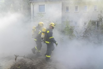 Civil defence exercise scenario, after a drone attack on a residential area, emergency services