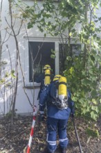 Civil defence exercise scenario, after a drone attack on a residential area, emergency services