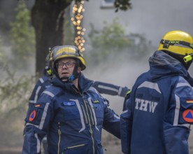 Civil defence exercise scenario, after a drone attack on a residential area, emergency services
