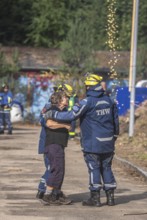 Civil defence exercise scenario, after a drone attack on a residential area, emergency services