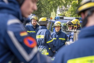 Civil defence exercise scenario, after a drone attack on a residential area, emergency services