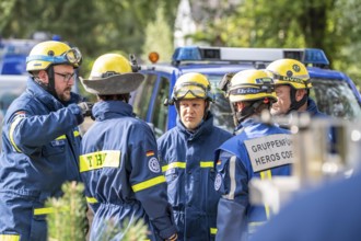 Civil defence exercise scenario, after a drone attack on a residential area, emergency services