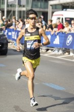 Akira Akasaki (JPN), later runner-up, at KM38 in front of Potsdamer Platz at the 51st BMW Berlin