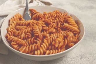 Fusilli pasta dish, made with tomato sauce, homemade, no people