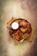 Potato pancakes, pancakes with sour cream, Belarusian dish, homemade, no people