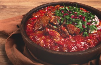 Chashushuli, a traditional Georgian dish, spicy, stewed meat with tomatoes and spices, homemade, no