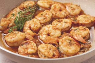 Shrimp dish cooked, in savory sauce. with fragrant herbs, and spices