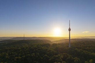 Panoramic view at sunrise, silhouette of the television tower above the woods, Stuttgart,