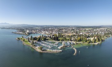Harbour area, ferry port, yacht harbour, marina of the town of Romanshorn with Seepark, far left