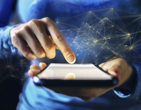 A close-up of a hand using a smartphone with a glowing digital network overlay, illustrating