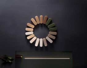 Loading symbol displayed against a dark-textured backdrop. Ideal for technology, progress, or
