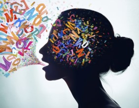 A striking depiction of creativity and communication, showing colorful letters flowing from the