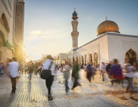 Travelers walk through an scanic architecture and culture of Muslim country, AI generated