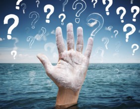 An extended hand emerges from water surrounded by floating question marks, artistically