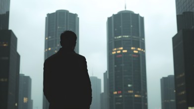 Man silhouette with modern cityscape art print, symbolizing reflection, ambition, and journeys