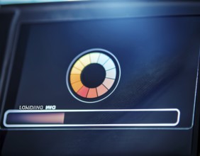Loading symbol displayed against a dark-textured backdrop. Ideal for technology, progress, or