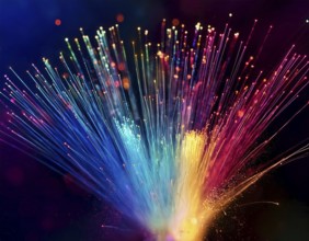 Glowing fiber-optic lights in vivid colors, creating a futuristic and dynamic visual effect, ideal