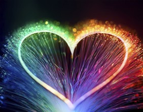 Colorful artistic display featuring vibrant light patterns shaped like a heart, expressing love and