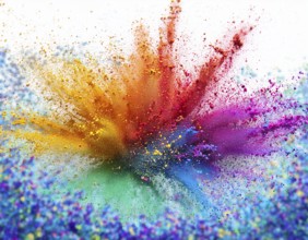 Vibrant and energetic multicolored powder explosion captured against awhite background. Evoking