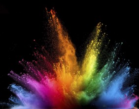 Vibrant and energetic multicolored powder explosion captured against a dark background. Evoking