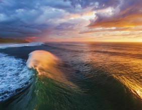 Vivid Ocean Wave Under Colorful Sunset with Dramatic Sky and Clouds, AI generated