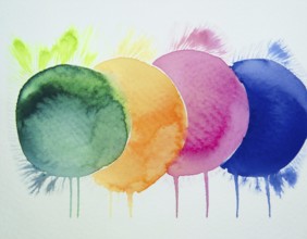 Colorful watercolor circles painted on a white background create a vibrant and artistic design.