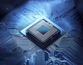 A close-up view of a glowing central processing unit on a bluish circuit board, representing